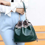 Women Serpentine Pattern Bucket Bags Tassel Chain Shoulder Bags Crossbody Bags